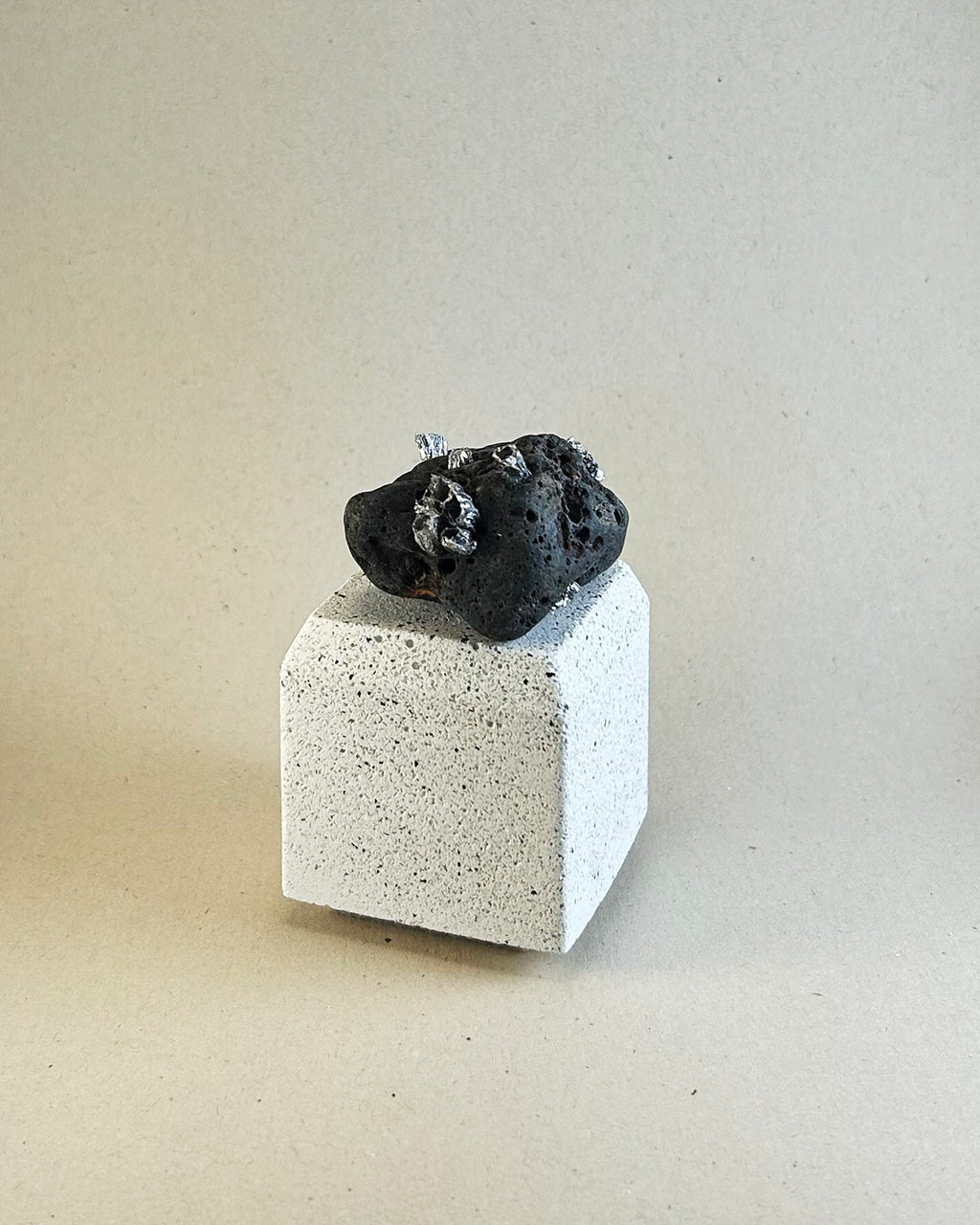Metal Barnacles on Lava Rock