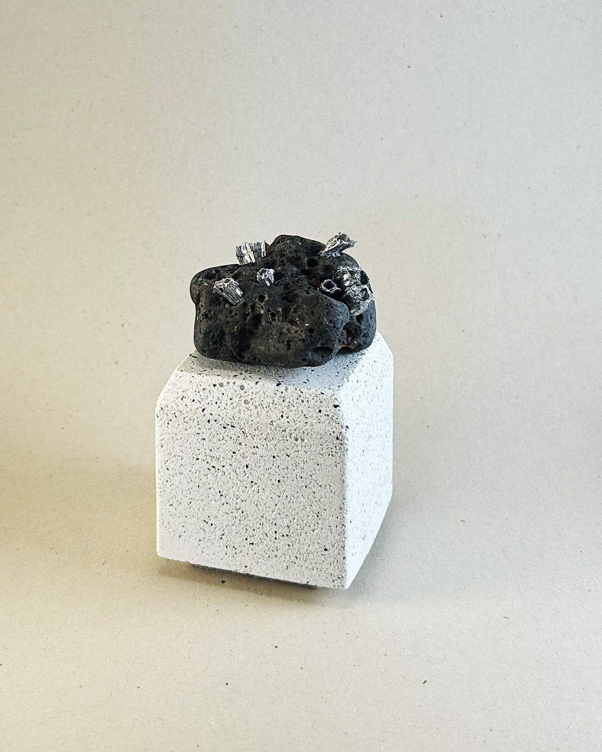 Metal Barnacles on Lava Rock